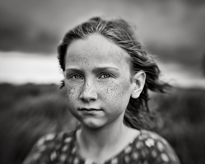 little girl with freckles